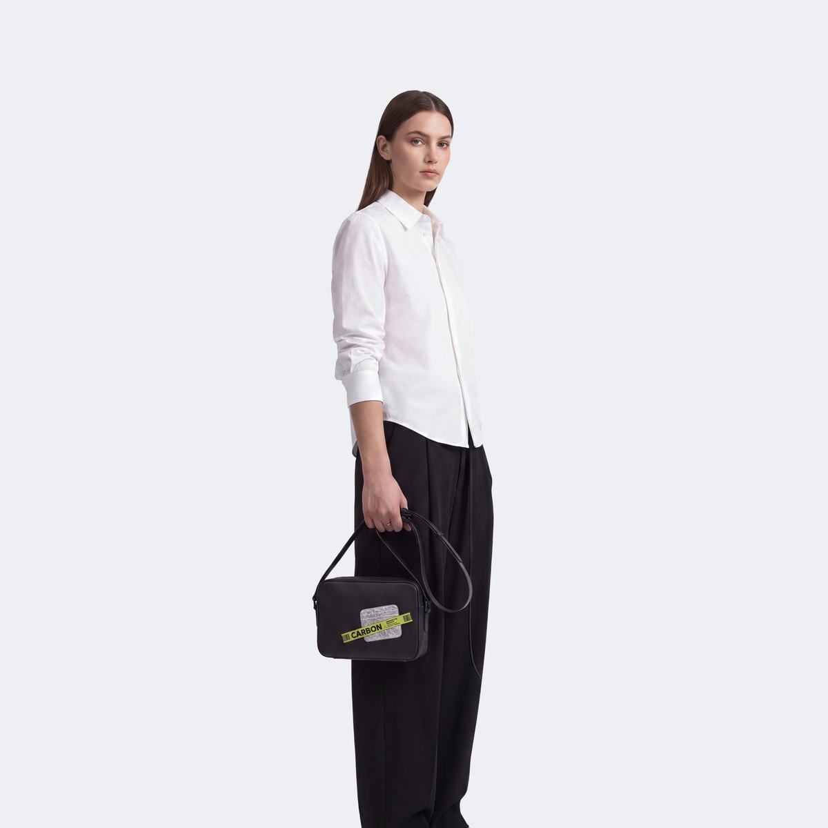 Carbon card sling bag with tape