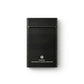 Black leather wallet with a humorous warning label on a white background