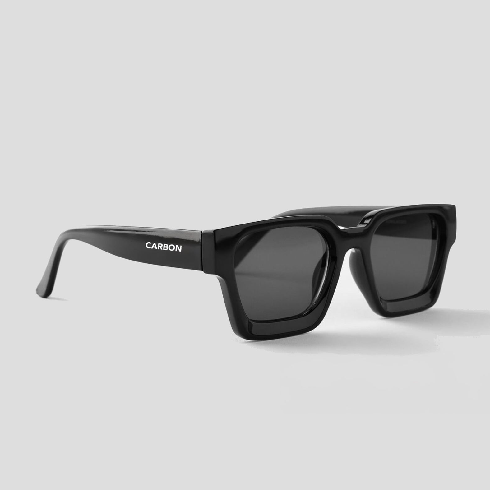 Side profile of Carbon NEXUS Black Square Sunglasses showcasing sleek carbon frame